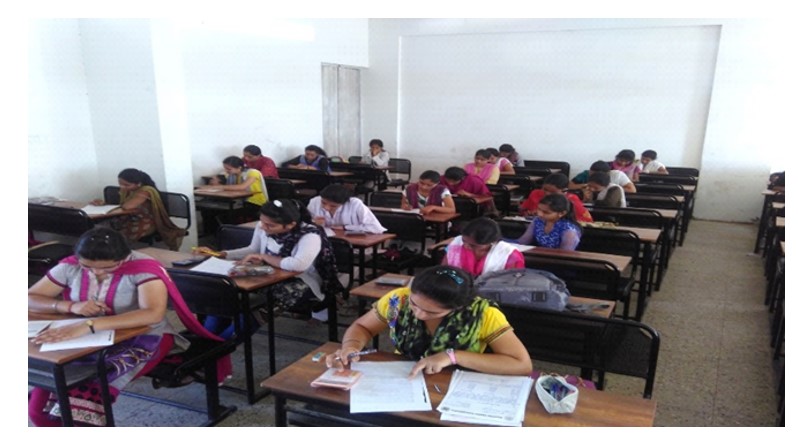 3)Quiz Contest Conducted for M.Com Students, Students were engaged in the examination