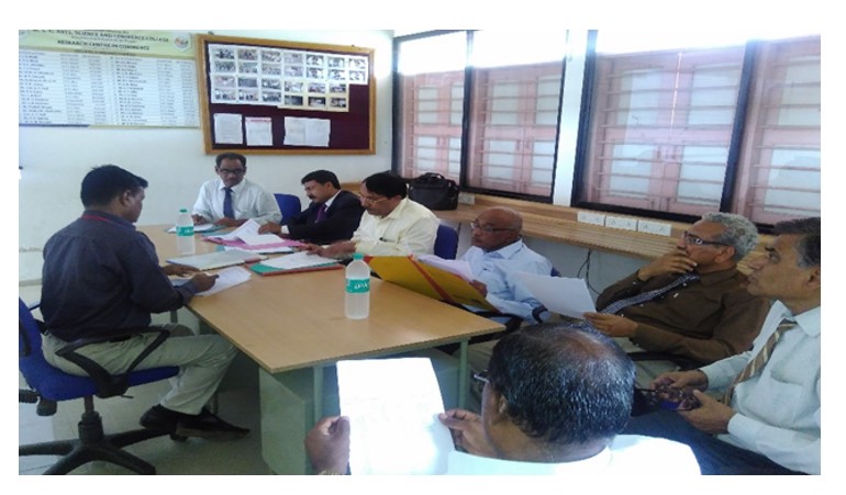 6)Principal Dr.D.B.Shinde and Dr. V.G.Mamde subject expert conducting Interview of Ph.D.Students. along with Dr. S.N.Nikam, principal of our College.